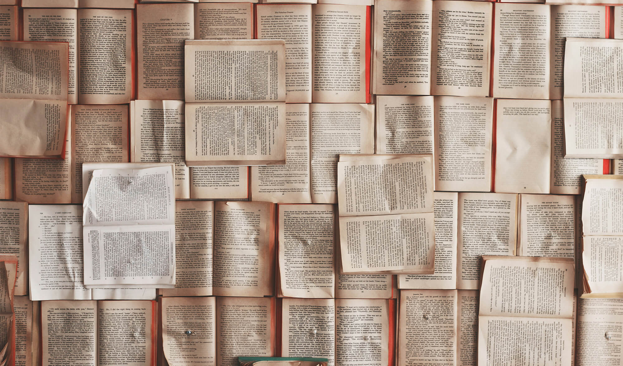 Layered book pages where your story starts